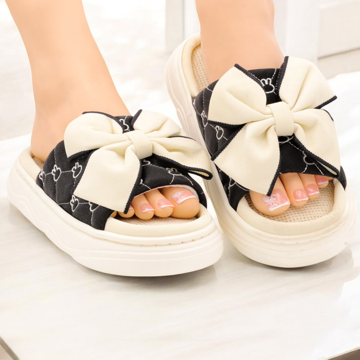 Alpha bow slipper